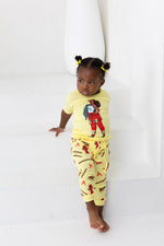 Load image into Gallery viewer, Little Girl wearing Firewoman pajamas
