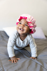 Baby girl wearing a bonnet