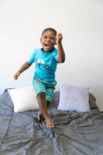 Load image into Gallery viewer, boy jumping on the bed
