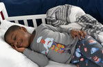 Load image into Gallery viewer, Boy sleeping in bed
